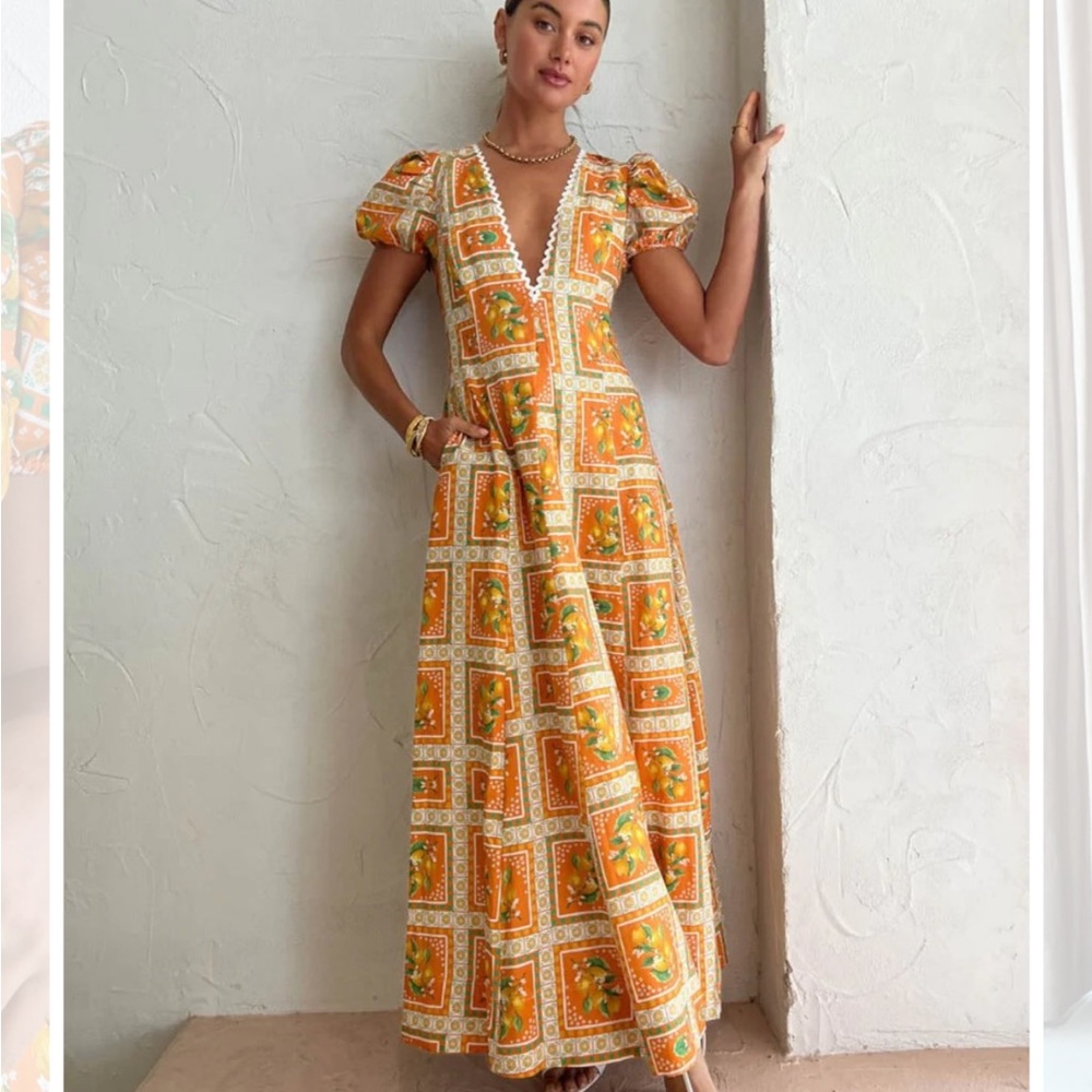 Vibrant Orange Floral Dress with Deep V-Neck - Picture 2 of 3